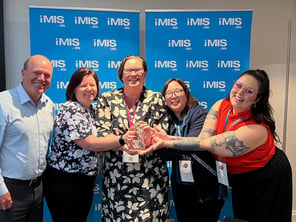 Four staff members from the Recruitment, Consulting & Staffing Association accept an iMIS Great Things Award for their website.
