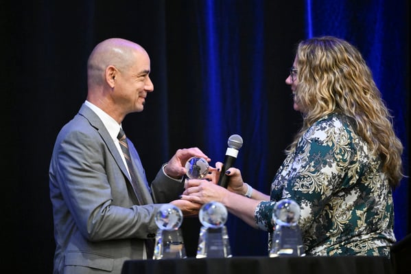 CMLTO accepts a Great Things Award for Member Engagement at the 2025 iNNOVATIONS Conference